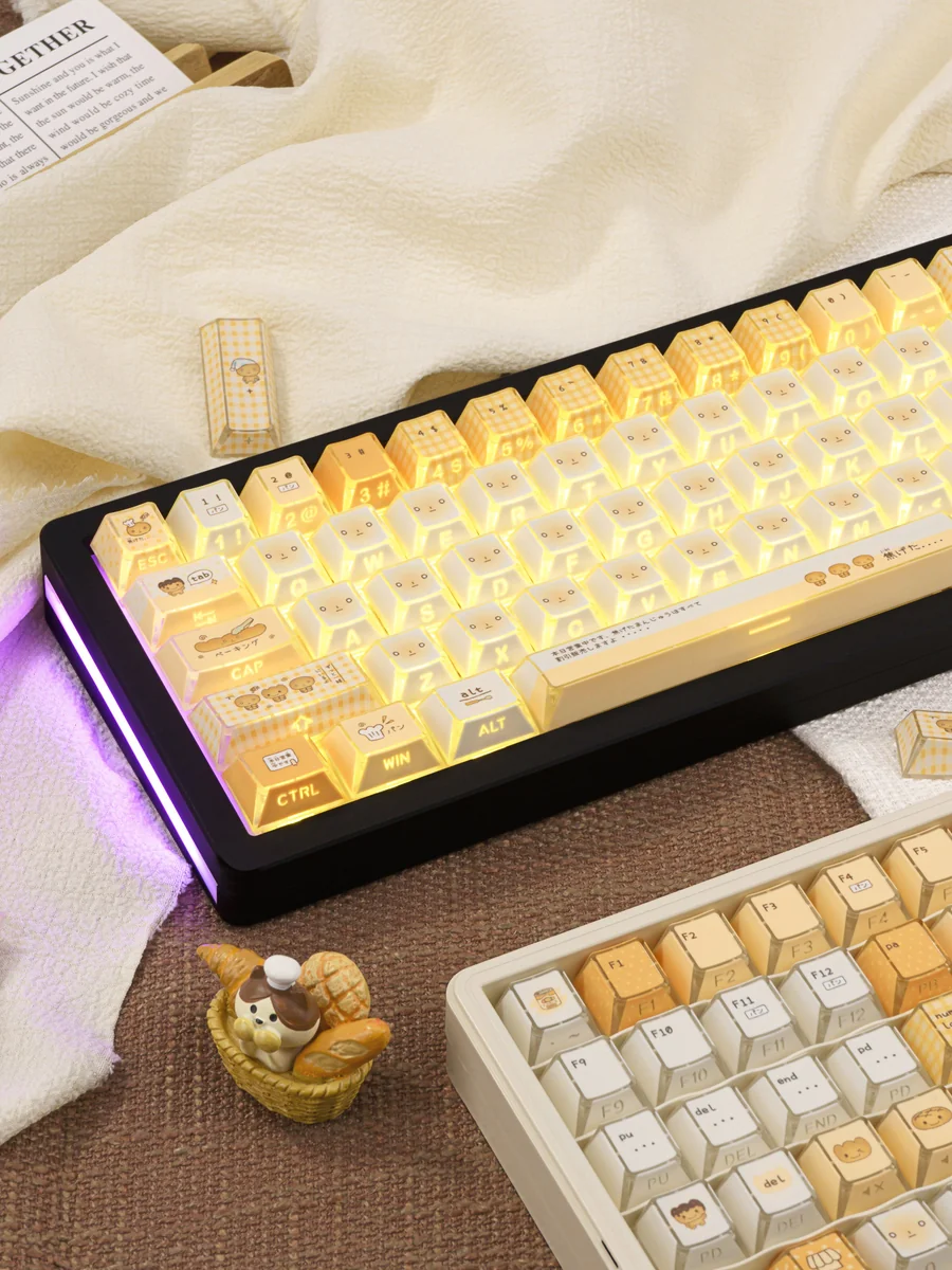 Playful Burnt Toast Shadow PBT dye-sub keycaps (126-key set). Warm hues mimic burnt bread, that with artistic angle.
