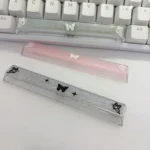 Handcrafted translucent butterfly artisan space key keycap, showcasing delicate ethereal butterflies glowing within resin, a unique artistic keyboard.