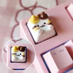 Main image of a unique handcrafted Calico Cat artisan keycap, highlighting its adorable, whimsical design and artistic vibrant details for keyboard essential.