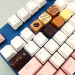 Caramel Coffee Bean Chocolate Keycap, handcrafted with warm, delectable patterns, displayed from various angles to reveal its unique design.