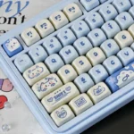 Unique PBT MOA Sea Salt Cat Keycap Set, an artistic collection showing its calm blue ocean hues and playful kitten from multiple perspectives.