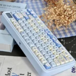 Unique Ocean Serenity PBT MOA Sea Salt Cat Keycap Set gallery, featuring a playful kitten in calm blue tones, reflecting tranquil ocean aesthetics.