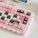 A collection of cute cat Dessert keycaps set in a whimsical dessert theme, featuring pastel colors and adorable feline illustrations, showcasing various angle.