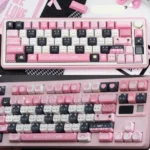 Cute Cat Dessert Keycaps set: adorable cats and whimsical desserts in pastel colors. Durable PBT keycaps for a charming, vibrant keyboard display.