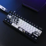 Exclusive Chainsaw Man Kobeni PBT keycaps set, showcasing Kobeni's chaotic charm with vibrant anime art from a unique angle, highlighting intricate design.