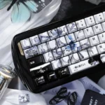 Premium Chainsaw Man Reze ceramic keycaps set, handcrafted with iconic character art. Various angles highlight the smooth, durable surface of this exclusive design.