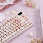 Cherry Blossom Keycaps MOA Profile PBT set gallery. Durable PBT and delicate pink floral design shown from various angles for a serene desktop.