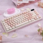 Cherry Blossom Keycaps MOA profile PBT set. Diverse angles highlight delicate pink floral designs, durable quality, and serene, artistic desktop appearance.
