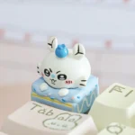 Close-up gallery views of a charming Chiikawa dessert pie artisan keycap for ESC, showcasing its adorable characters, sweet details, and vibrant color.