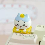 Close-up of a charming Chiikawa Dessert Pie Artisan Keycap for ESC, showcasing its adorable character design and vibrant dessert details from various angles.