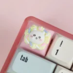 Handcrafted Chiikawa cream tart artisan ESC keycap, seen from a charming side angle, reveals its adorable pastel details and whimsical resin character design.
