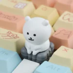Whimsical Chiikawa Joke Bear keycap showcasing its expressive design from various angles, perfect to express your unique artisan.