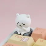 A collection of whimsical Chiikawa Joke Bear keycaps, showcasing various expressive designs and charming emotional variations from multiple angles.