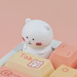 Various angles of the unique Chiikawa Joke Bear artisan ESC keycap, highlighting its handcrafted resin and playful, expressive whimsical charm for customization.