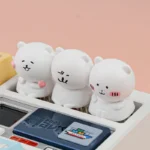 Close-up of a whimsical Chiikawa Joke Bear artisan ESC keycap, handcrafted from resin, showcasing its unique expressive charm and intricate details.