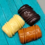 Artisan Chocolate Keycap, handcrafted from smooth resin, depicts rich gourmet chocolate with caramel swirls. A delectable, artistic keyboard accent.