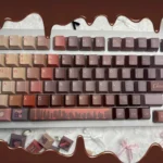 Chocolate PBT Keycaps Set: durable dye-sub legends viewed from multiple angles. Warm, inviting brown hues offer a comforting, dessert-inspired tactile feel.
