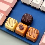 Multiple angles of Artisan Chocolate Resin Keycaps, sweet keyboard desserts. Rich chocolate, warm caramel, and coffee textures. Artistic handcrafted setup.