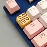 Artisan Chocolate Resin Keycap featuring a delightful striped milk yellow design, evoking a sweet, creamy keyboard dessert.