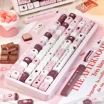 Chocolate Strawberry Series Keycap Set, showing dye-sublimated pastel pink, brown, and white keys from multiple dessert-inspired angles.