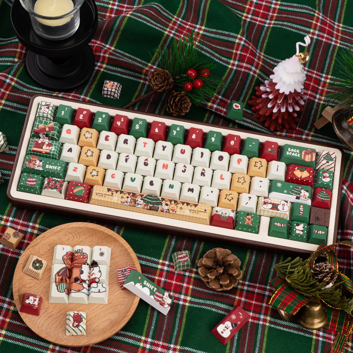 Vibrant PBT dye-sub Christmas Gift keycap set featuring playful Santa, snowman, and reindeer on a festive red/green keyboard, perfect for holiday cheer.