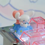 Close-up of the whimsical Cinnamoroll Nebula Heart Shaped ESC Keycap, showing its sparkling cosmic design and dreamy charm from a distinctive angle.