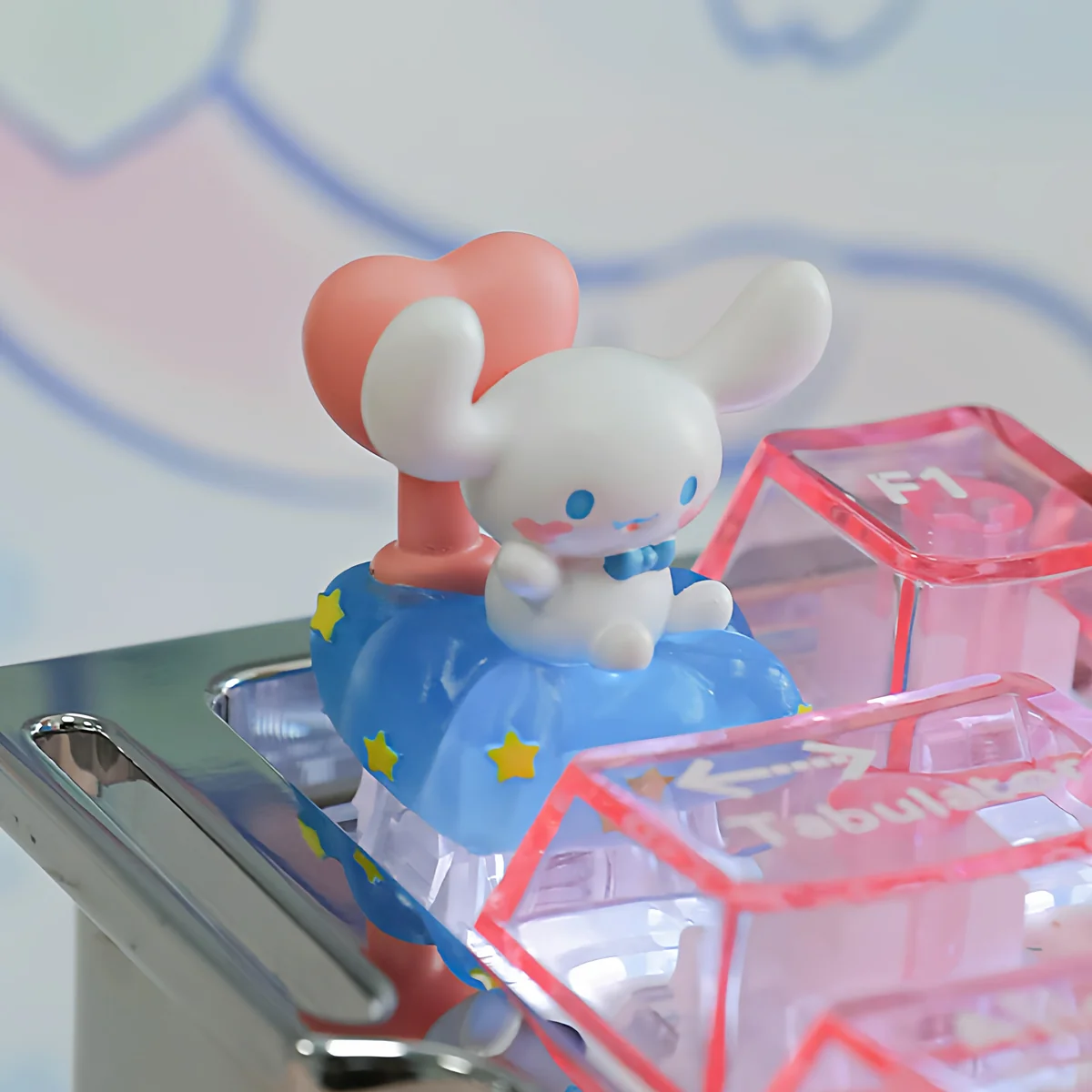Close-up of the whimsical Cinnamoroll Nebula Heart Shaped ESC Keycap, showing its sparkling cosmic design and dreamy charm from a distinctive angle.