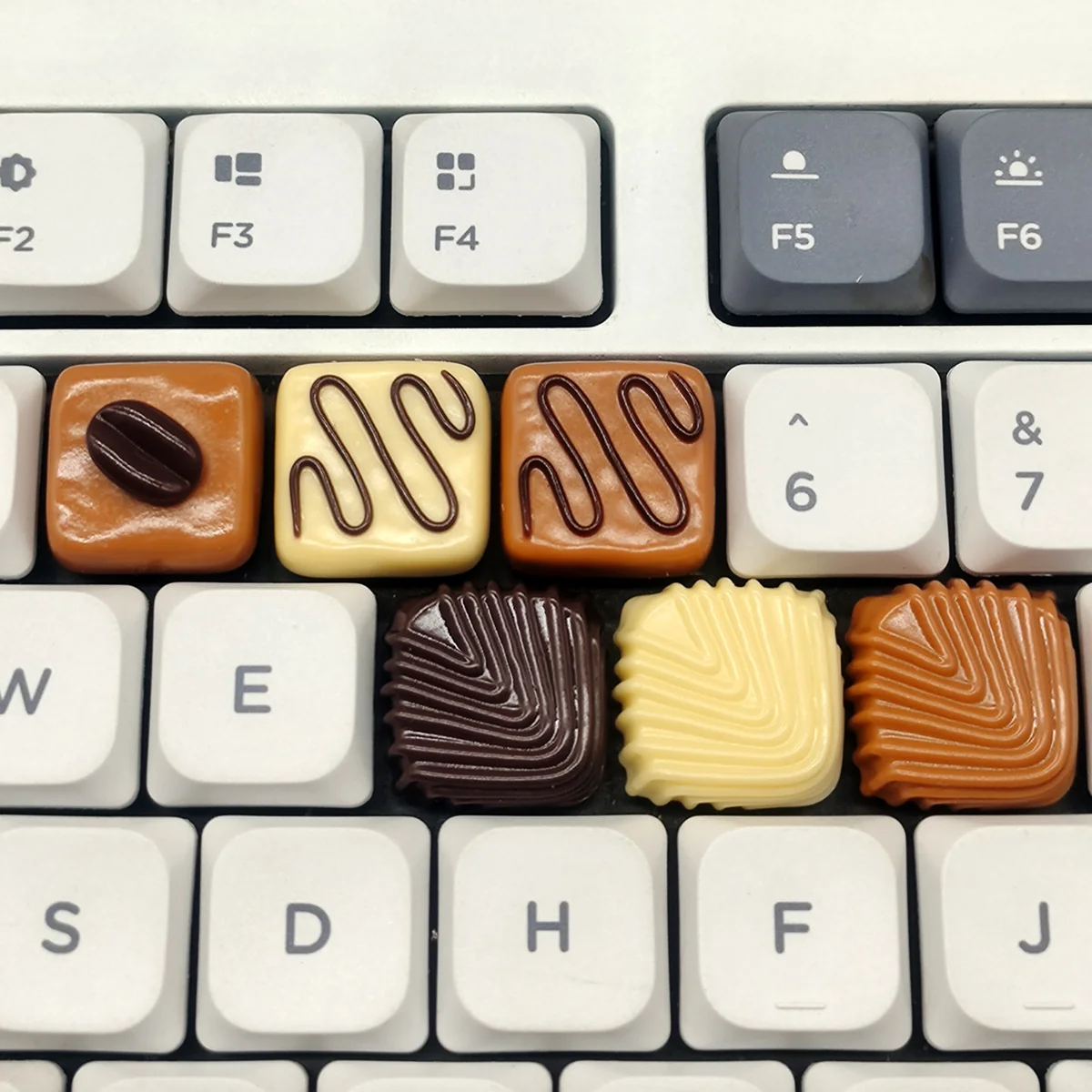 Caramel Coffee Bean Chocolate Low Shaft Keycap from a new angle, featuring warm dessert and coffee aesthetics with intricate coffee bean patterns.