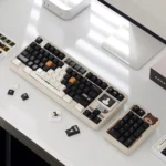 Distinctive Cow Cat PBT keycap set, featuring artistic high-contrast black and white cow cat motifs for custom keyboards. Playful and expressive design.