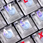 Vibrant Crayon Shin-chan PC keycap set, 109 translucent keys shown from multiple playful angles, highlighting exclusive anime art and dynamic backlighting design.