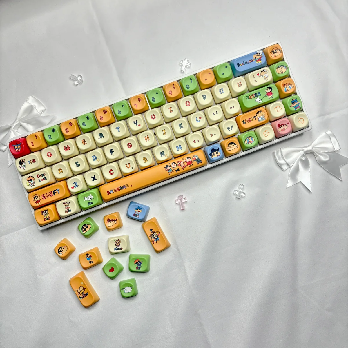 A playful Crayon Shin-chan MOA keycap set, featuring vibrant dye-sub PBT keycaps with iconic characters and whimsical scenes, perfect for a fun keyboard.