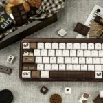 A curated gallery showcasing the unique crispy Dark Chocolate PBT keycaps set from various artistic angles, highlighting their rich textured of chocolate motifs.