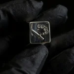 Premium CSGO keycap art piece, meticulously detailed and showcasing its metallic craftsmanship from a distinct side angle.