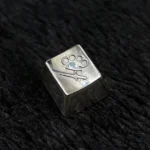 A premium CSGO keycap collection, showcasing detailed artisan craftsmanship from various angles. Authentic metallic in-game item replicas.