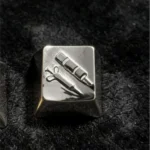 Premium CSGO keycap crafted from exquisite needle tube copper, showcasing an authentic, detailed in-game item replica with a polished metallic design.