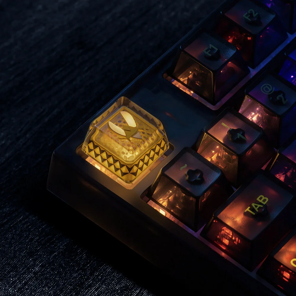 A close-up view of the premium CSGO Team Vitality backlit ESC keycap, showcasing its luminous hollow bee logo and sleek gaming design from multiple angle.