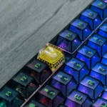 Premium CSGO Team Vitality backlit ESC keycap shown from multiple angles, highlighting the luminous bee logo and sleek hollow design for an immersive design.