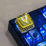 Premium CSGO Team Vitality backlit ESC keycap featuring the iconic bee logo, hollowed-out design, and luminous glow for an ultimate gaming aesthetic.