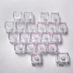 Close-up of sparkling translucent cute cat heart keycaps set, showing whimsical glitter and transparent PC material from a playful angle.