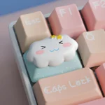 Detailed view of the Cute Cloud & Star Artisan Keycap, highlighting its unique cosmic amidst vibrant cloud and twinkling stars.