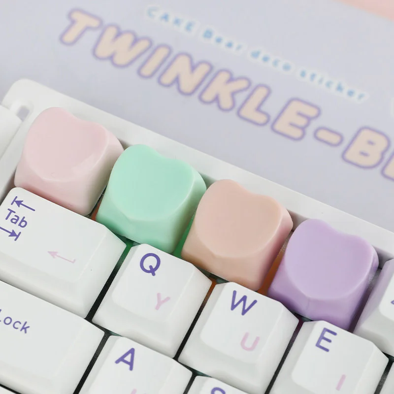 A collection of cute heart keycaps for ESC, showcasing their adorable pastel design from various angles, perfect for a playful, personalized keyboard.