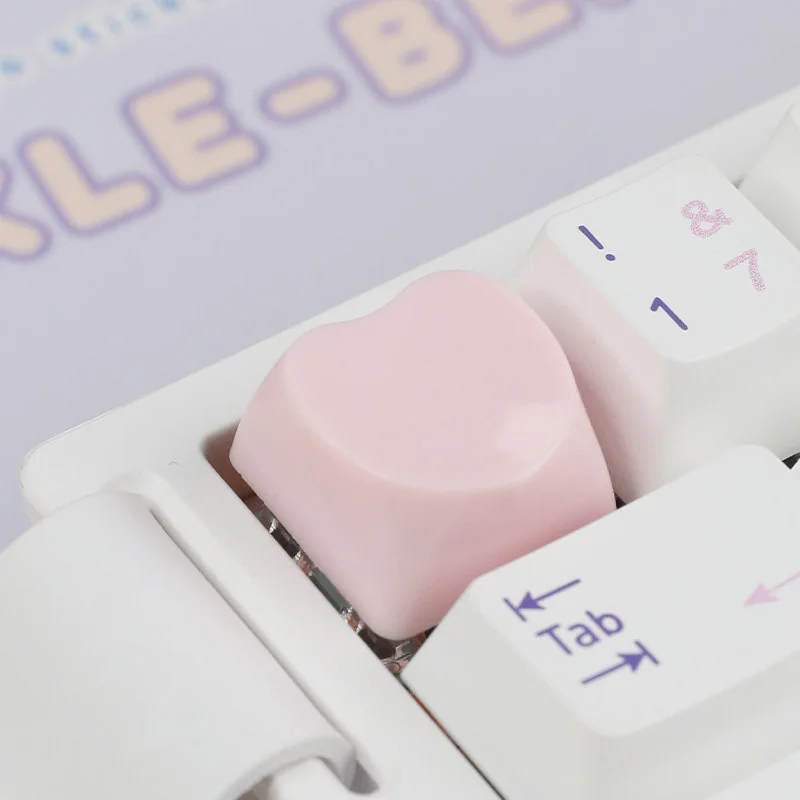 Adorable soft pastel hues Cute Heart Keycap for ESC, shown from a delightful angle, adding a playful and personalized charm to any keyboard.