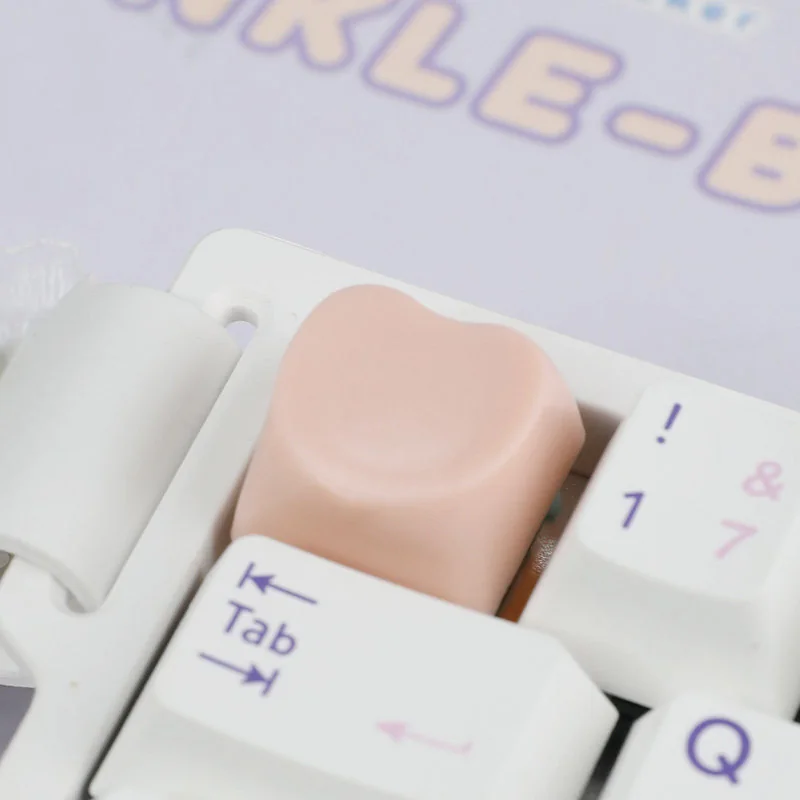 Playful heart keycap for ESC, adding a cute, whimsical touch and personalized charm to your keyboard.