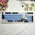 Artistic Rei Ayanami EVA backlit PBT keycap set display, showcasing enigmatic design, sharp angles, and glowing translucent legends for a unique aesthetiics.