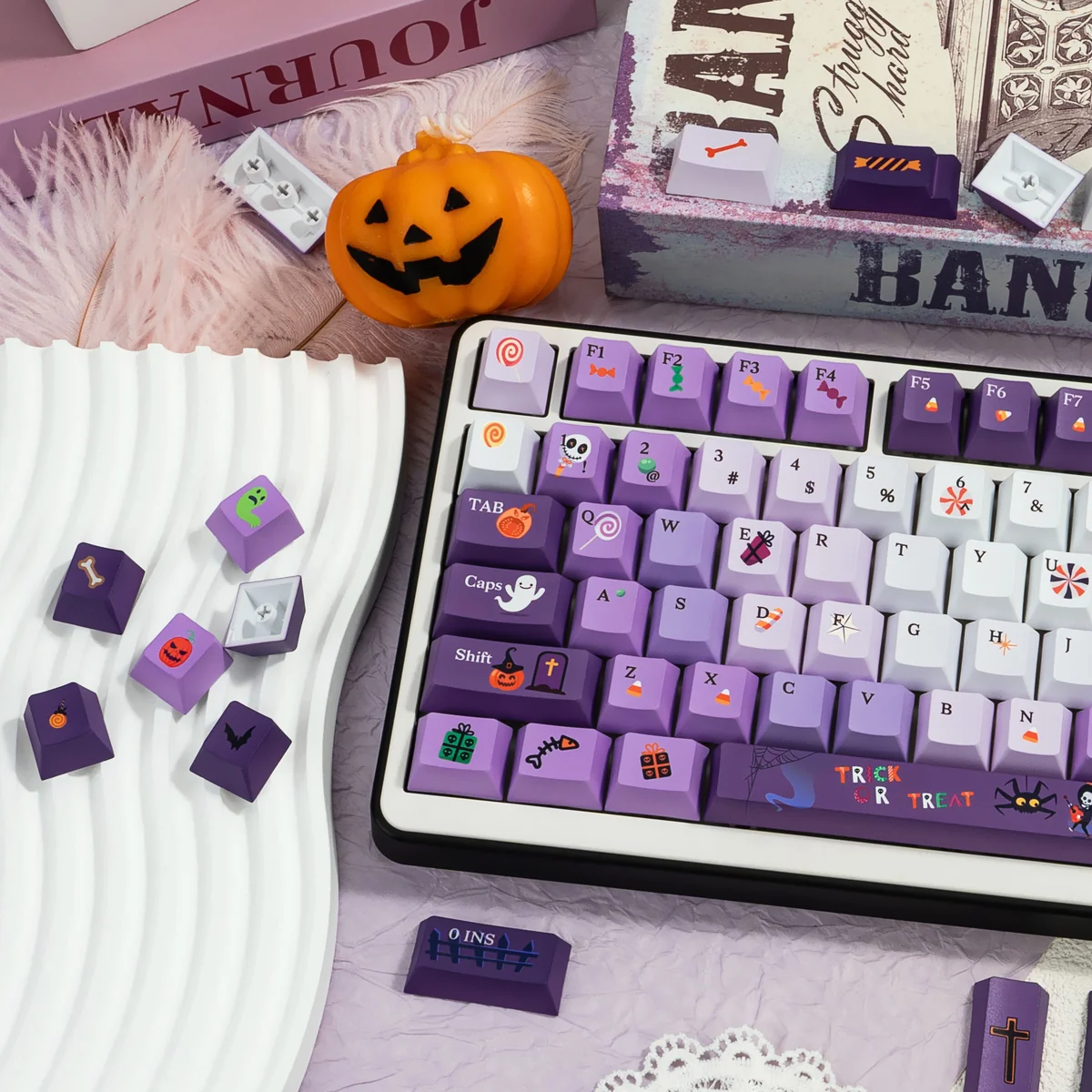 Dark Moon Candy Whimsical Halloween PBT Keycaps Set. Unique dye-sub graphics from various angles: playful ghosts, sweet candies, spooky-sweet fun.