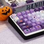 Gallery view of Dark Moon Candy Whimsical Halloween PBT keycaps set, showcasing unique dye-sublimated spooky and sweet designs from multiple playful angle.