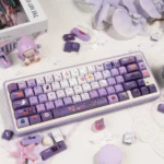 A whimsical gallery of Dark Moon Candy Halloween PBT dye-sublimated keycaps set, featuring playful spooky ghosts and sweet candy designs from multiple angle.