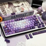 Unique Dark Moon Candy Halloween PBT keycaps set, a dye-sublimated set featuring whimsical ghosts, vibrant candies, and spooky night designs for a playful art.