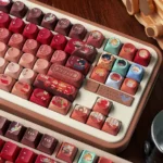 Whimsical Delicious Dungeon keycap set gallery showcasing various angles of anime characters and fantastical food art, perfect for exclusive keyboard customization.