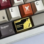 Premium Delta Force Map Access Keycap showcasing its dark tactical military design from multiple angles, featuring intricate gold map details for gaming setup.